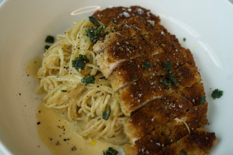 yellow pasta chicken cutlet white bowl basil fried sage